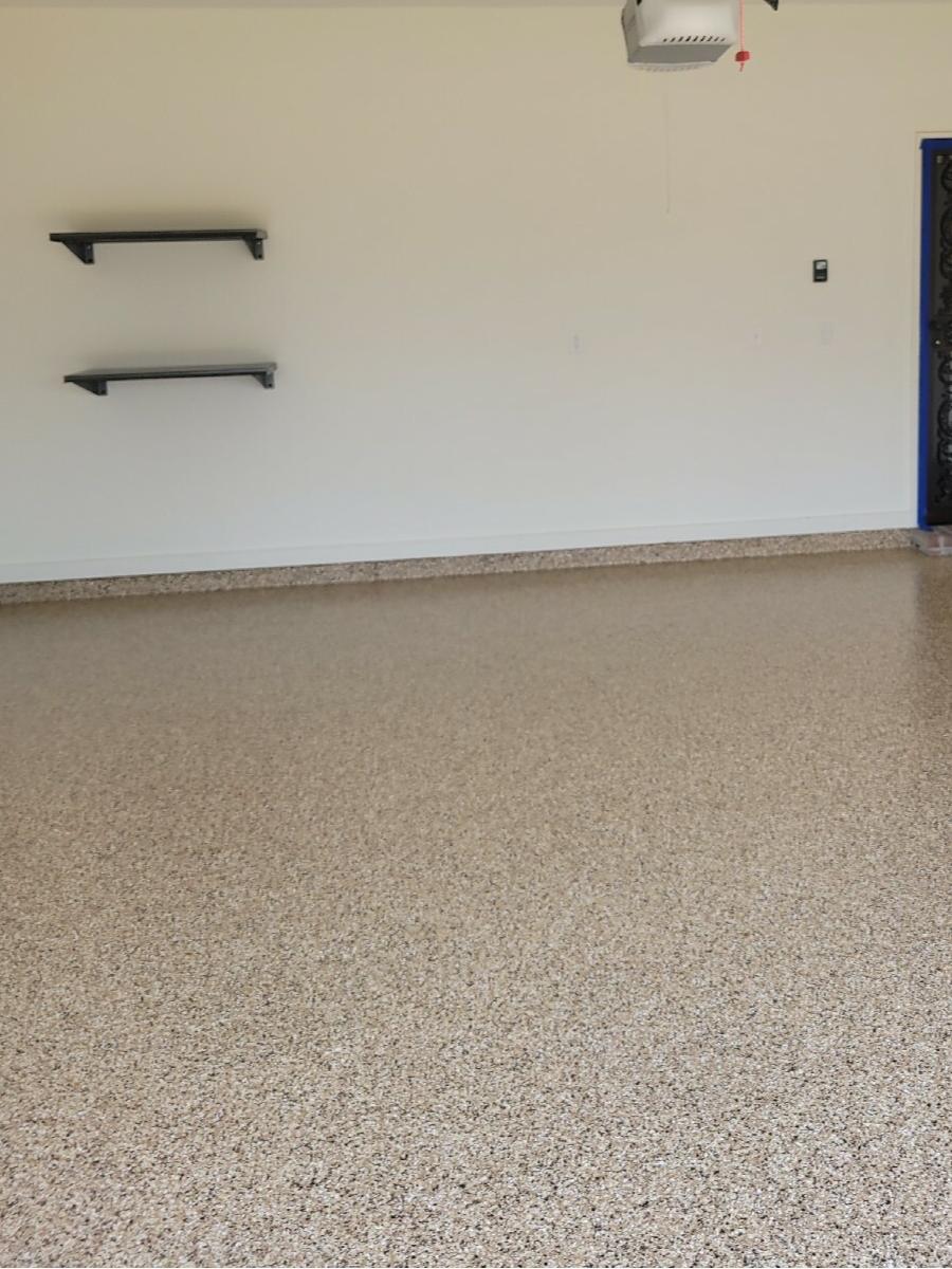 New garage floor coating with floating shelves