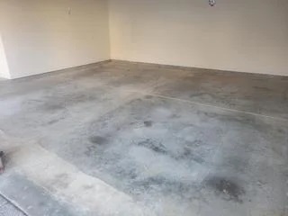 Stained old garage concrete