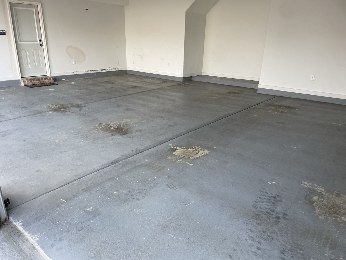 Damaged concrete garage floor
