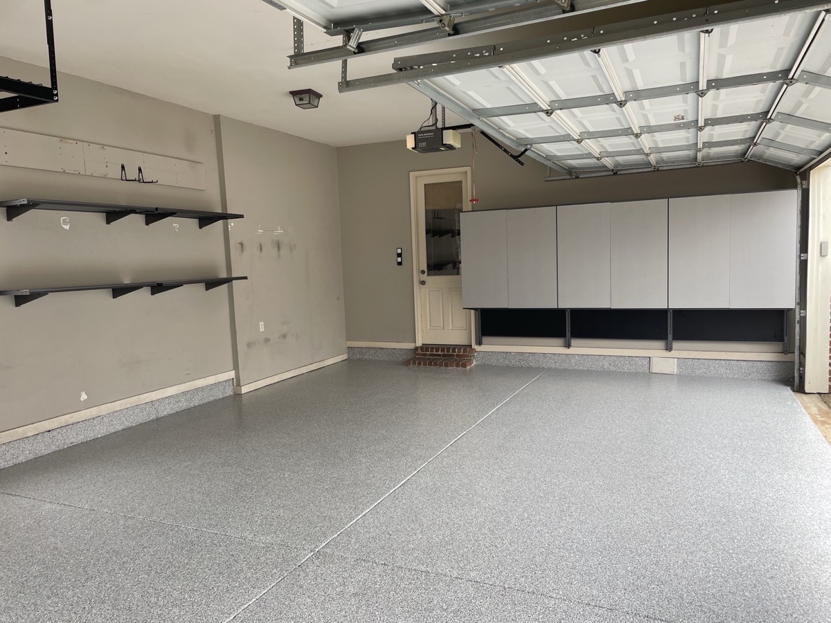 new polyaspartic flooring and garage cabinets