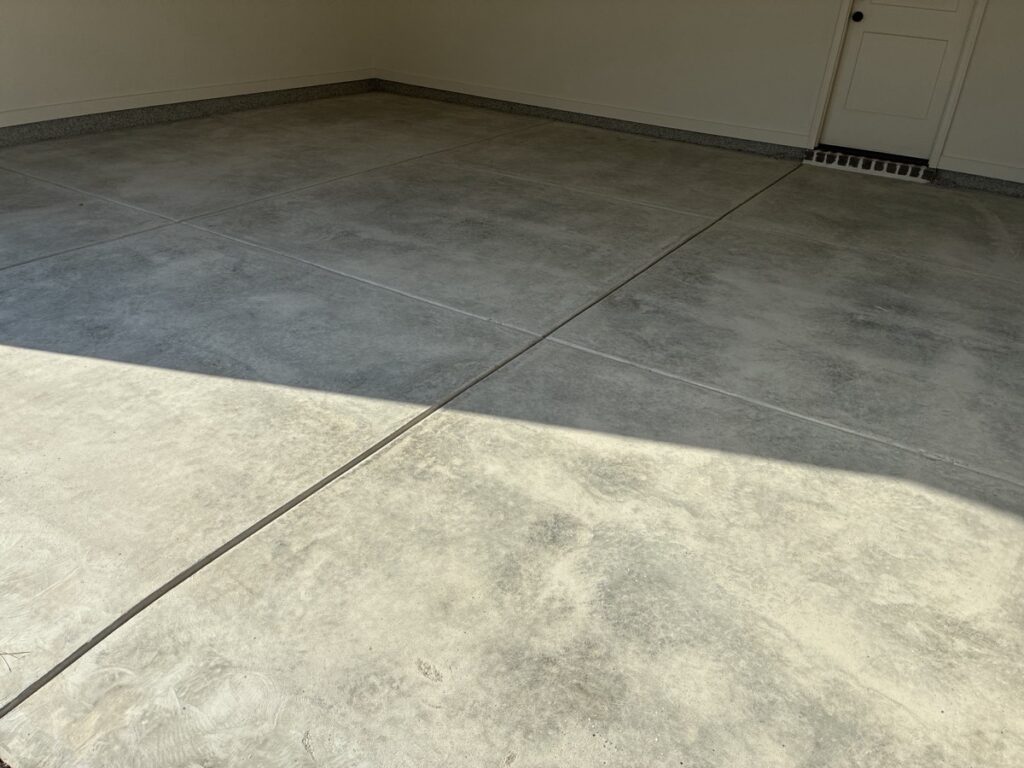 Stained Garage Floor Before Coating