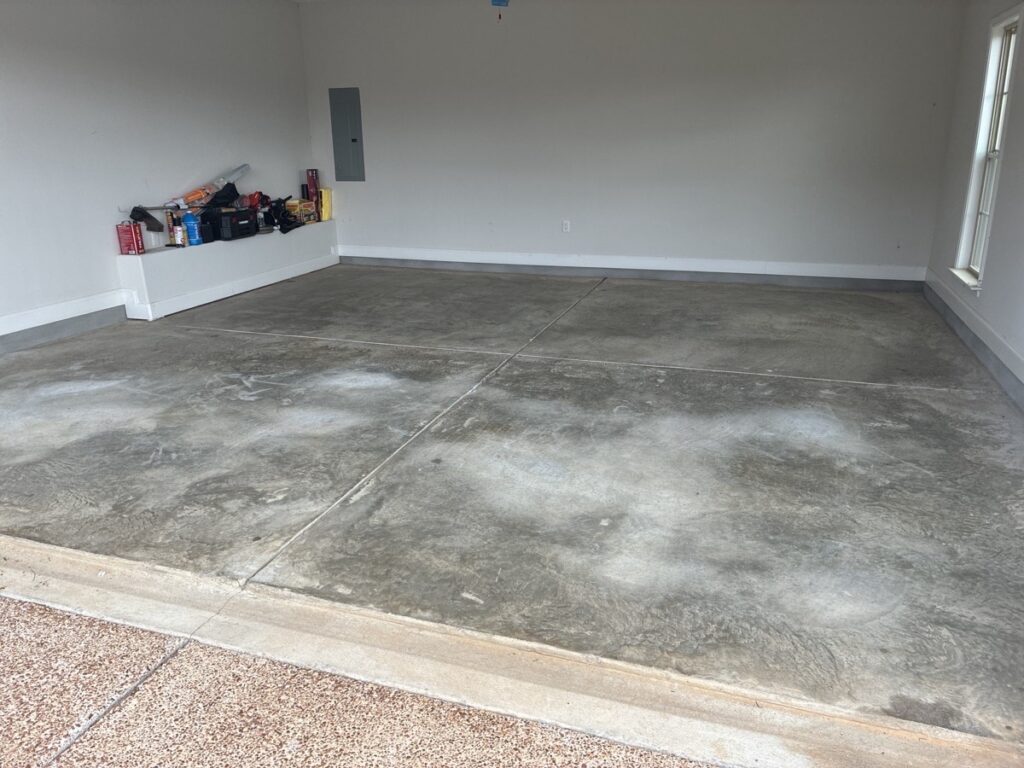 Stained Dirty Garage Floor Needing Remodel