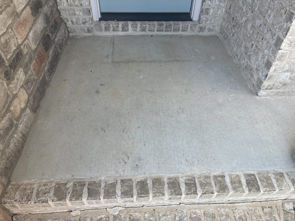 before concrete coating on front porch in arlington