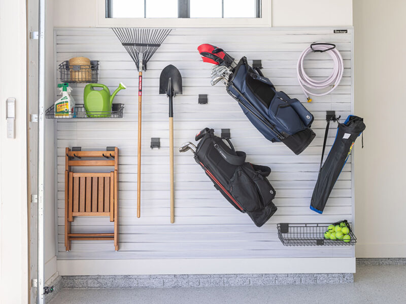 2023-Street-Of-Dreams-Garage-17-HiRes-_1-800×600-1 Slatwall with various tools and sports equipment
