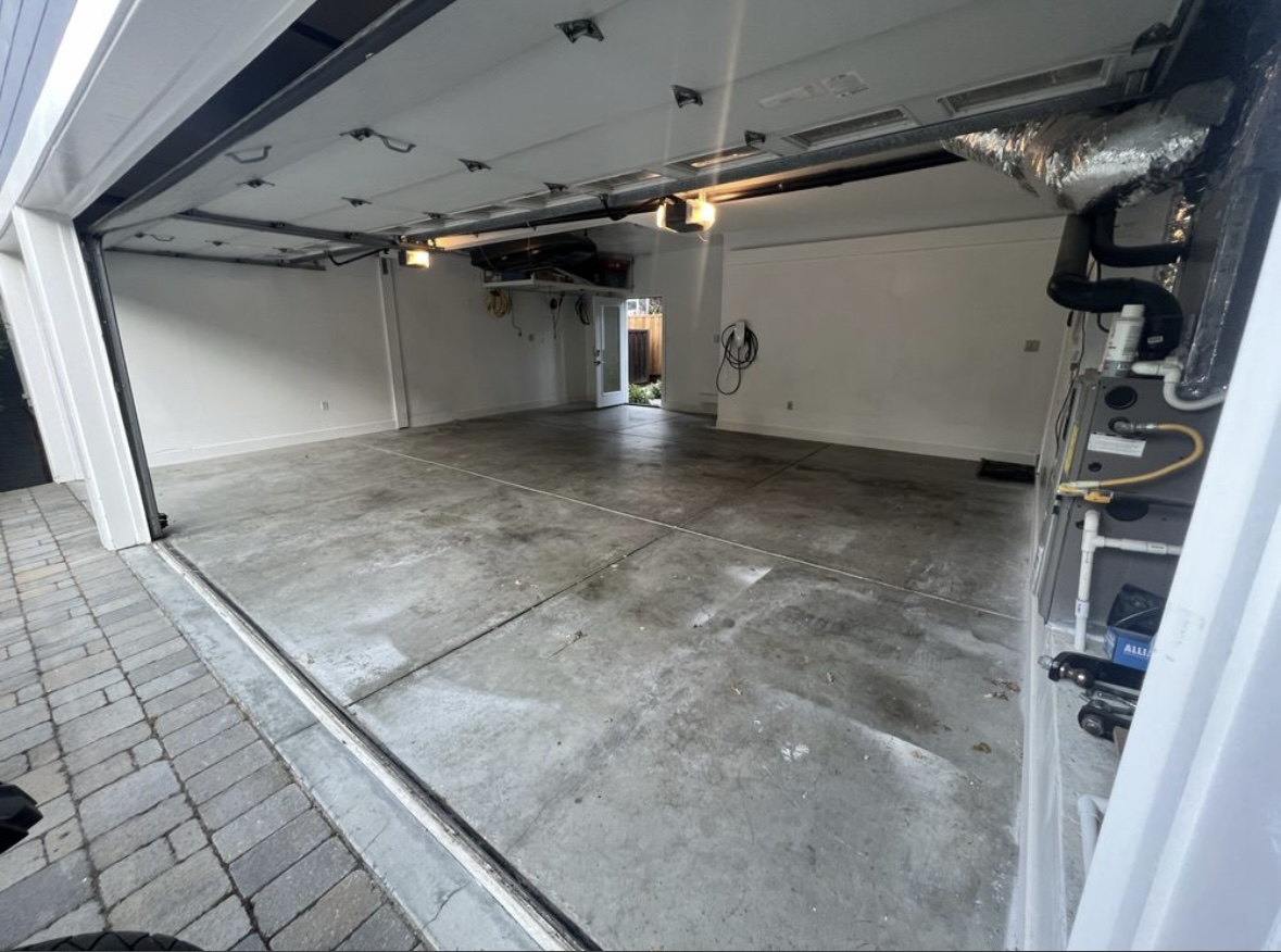 damaged, stained concrete floor