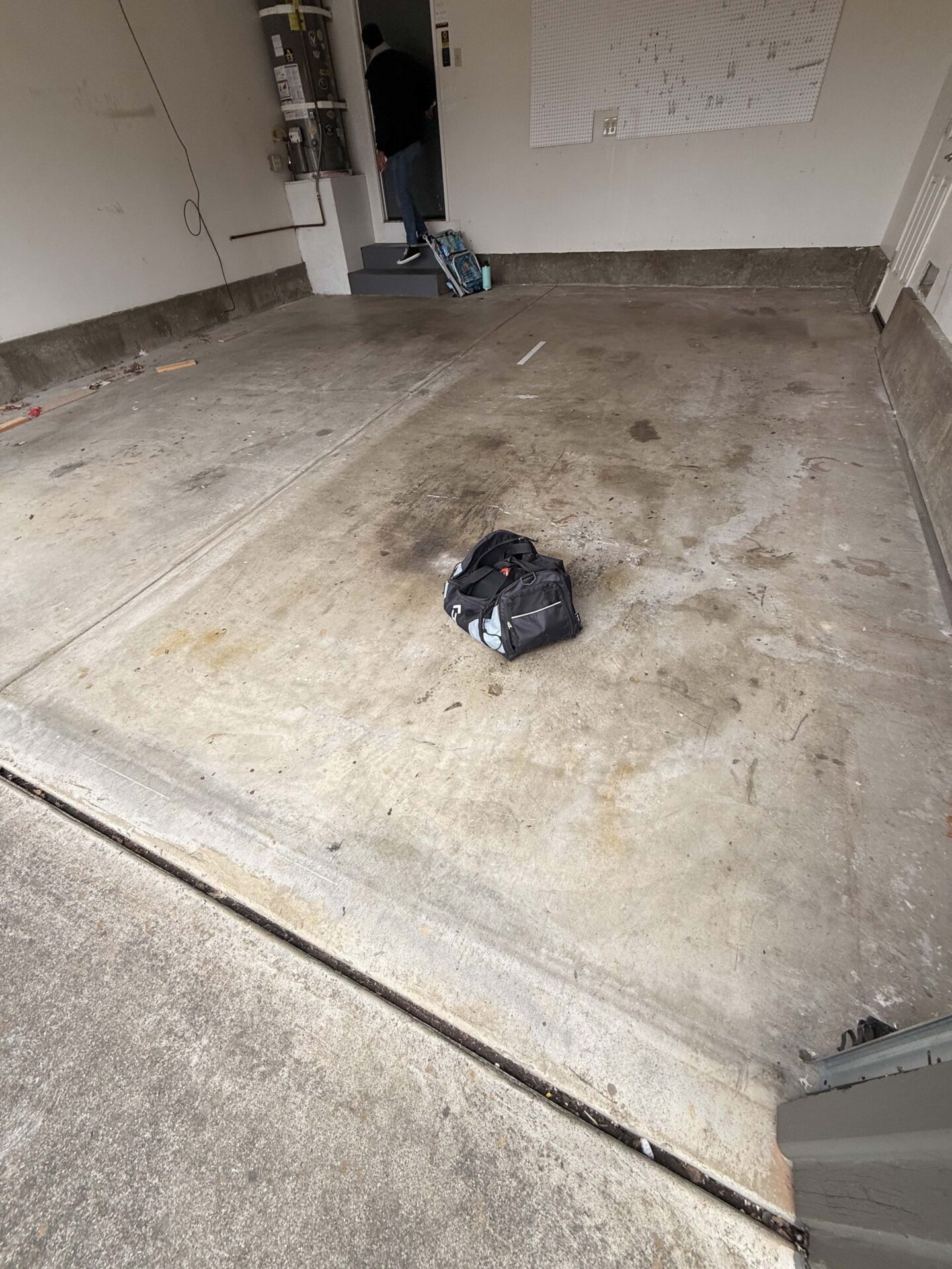stained, dingy garage floor concrete