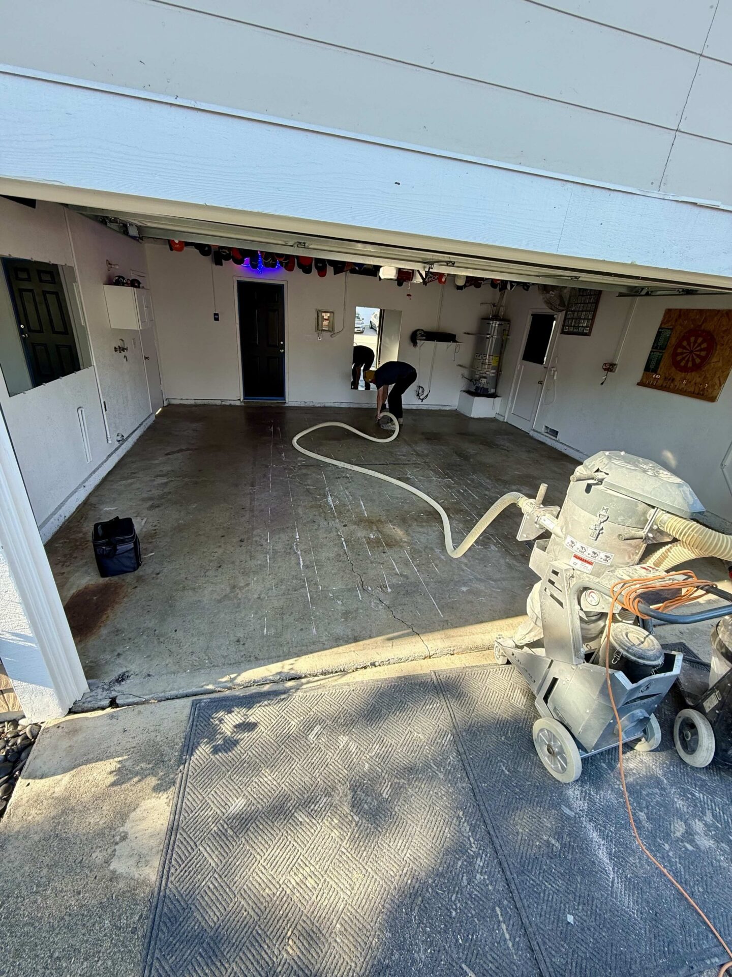 uncoated dingy garage floor concrete