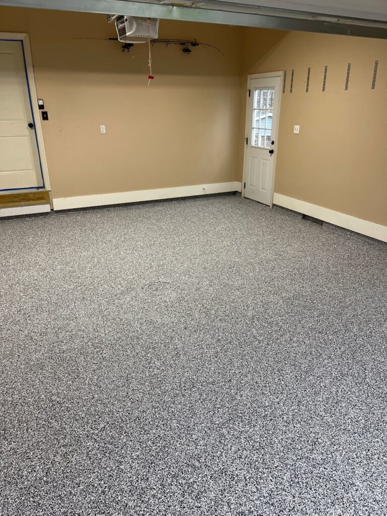 Garage Floor Coating by Hello Garage in a grey flake