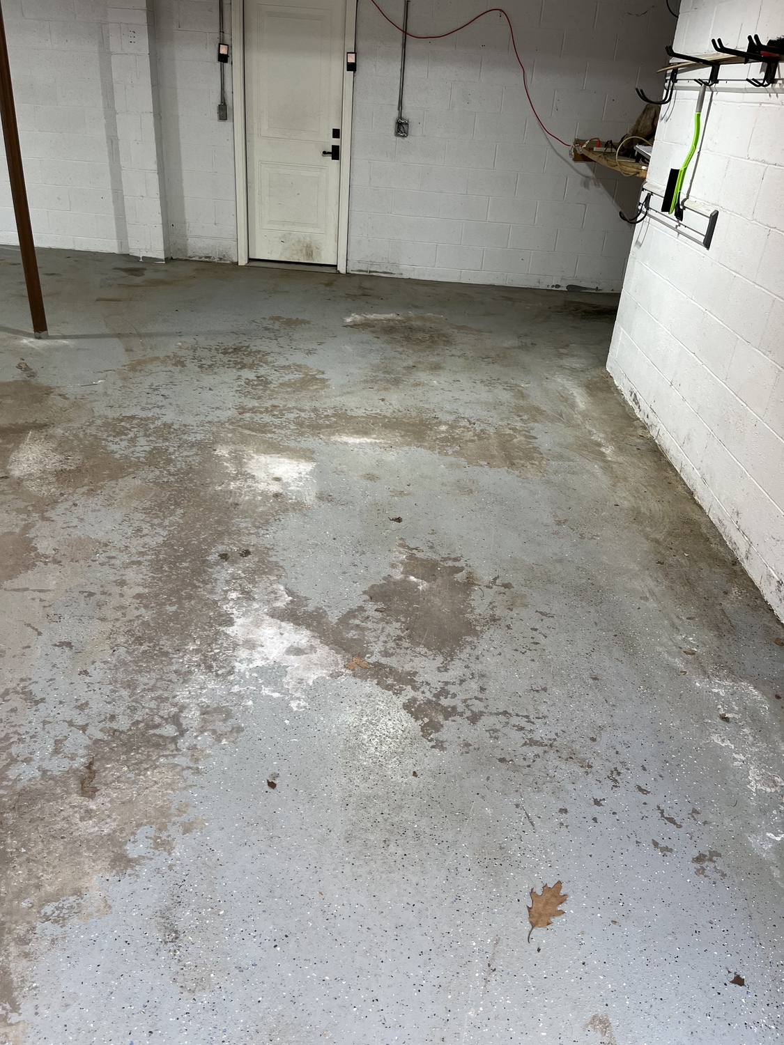 Peeling Grey Epoxy on a Garage Floor in Sewickley Pennsylvania