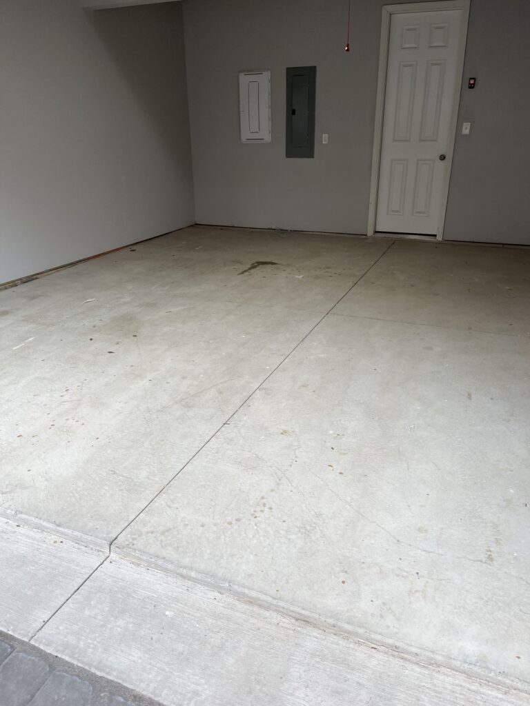 Bare Garage Floor in Mars before a garage floor coating