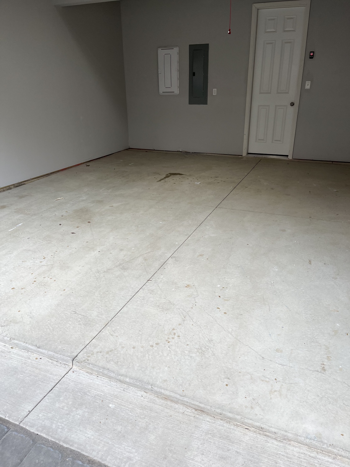 Bare Garage Floor in Mars before a garage floor coating