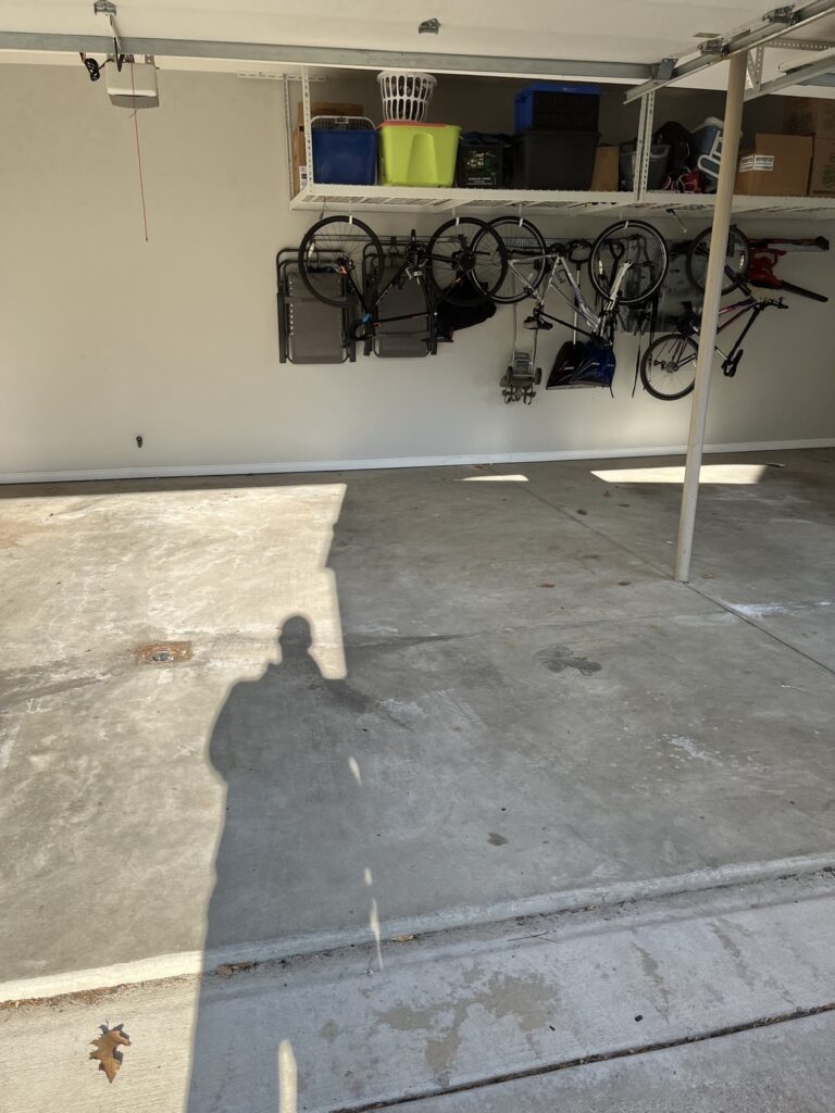 Garage with bikes hanging on the walls