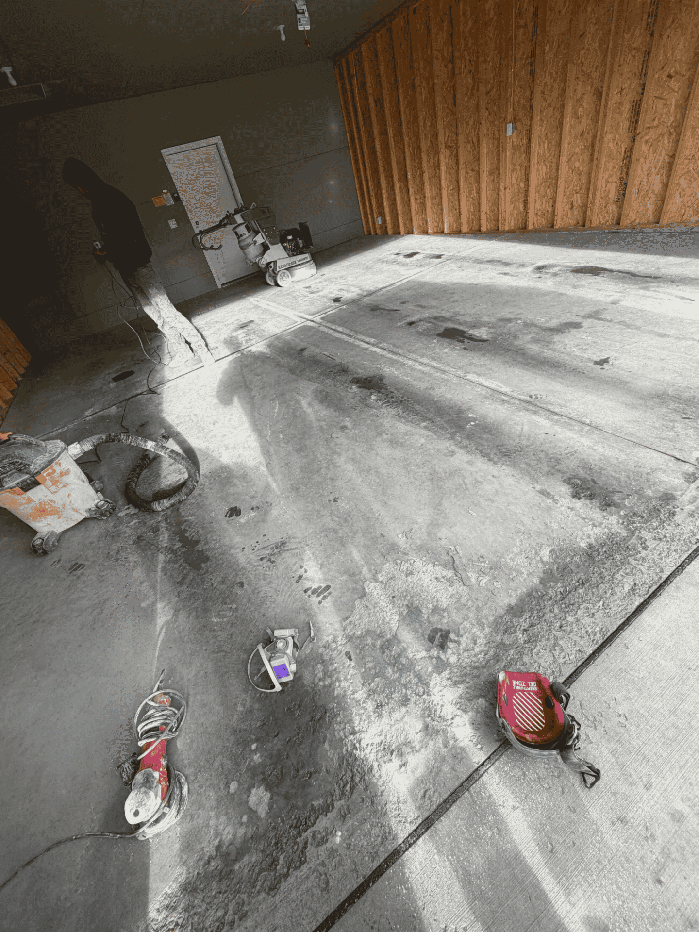 stained and cracked garage floor concrete