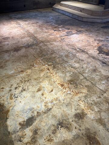 Dingy concrete garage flooring