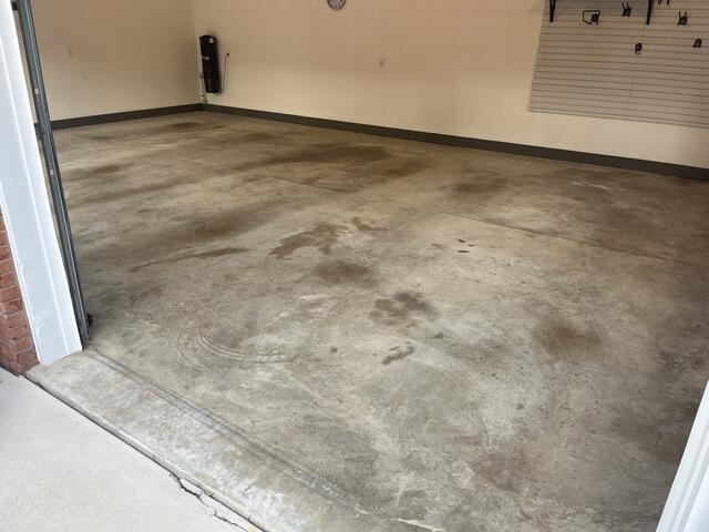 Dingy, stained garage concrete