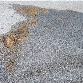 ServiceDetail_GarageFloor_Epoxy_ChemBurns Chemical burn on concrete coating