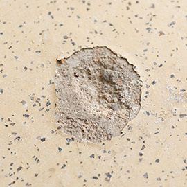 Service_Flooring_Epoxy_ChemBurns Peeling and flaking in concrete