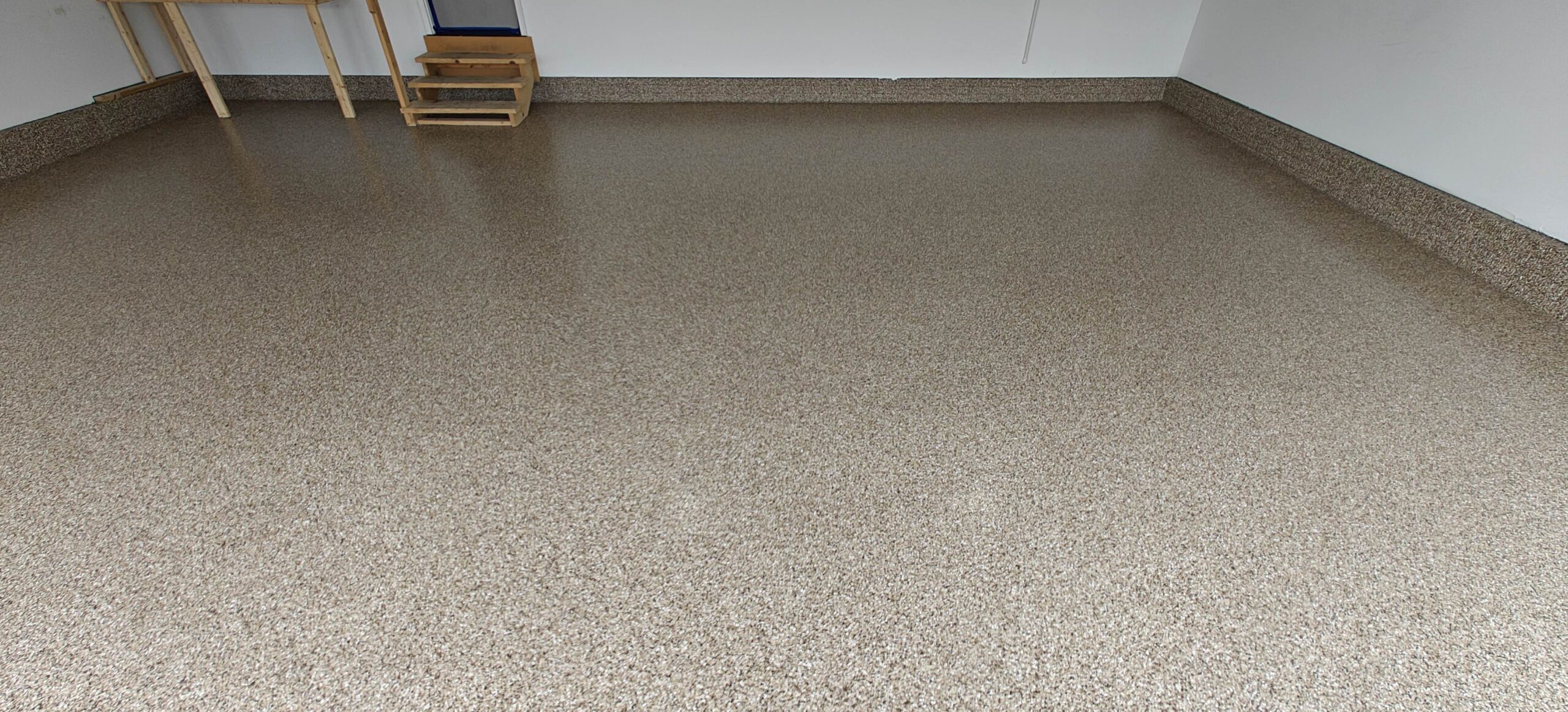 Beautiful taupe polyaspartic concrete coating