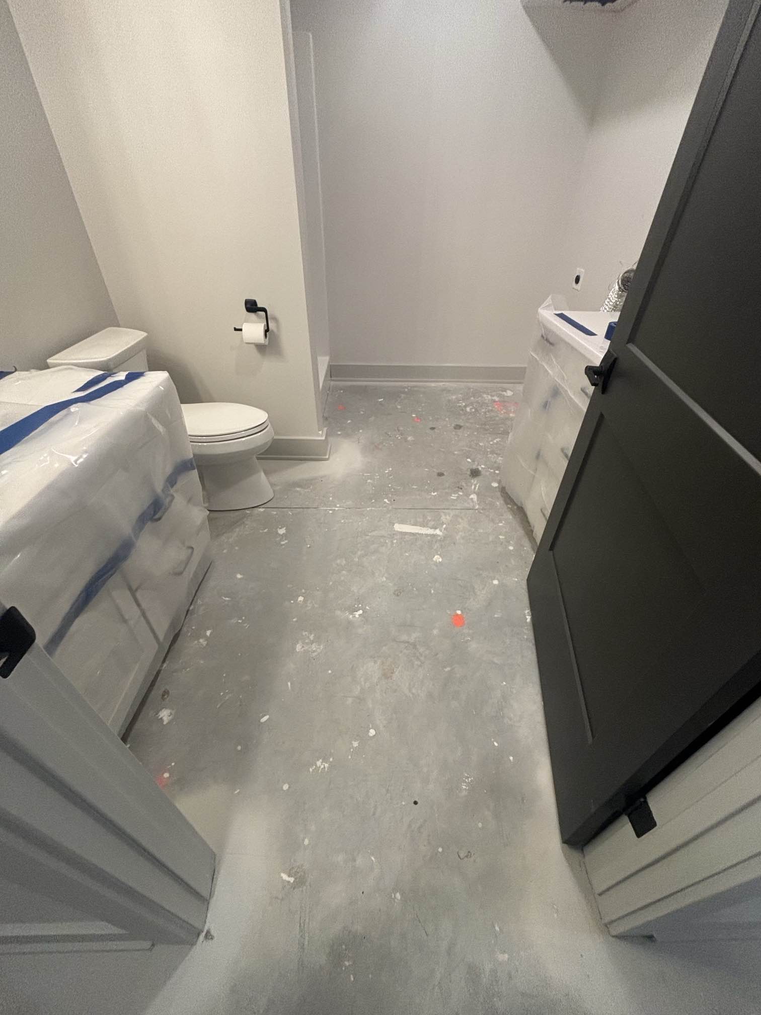 Plain concrete basement bathroom