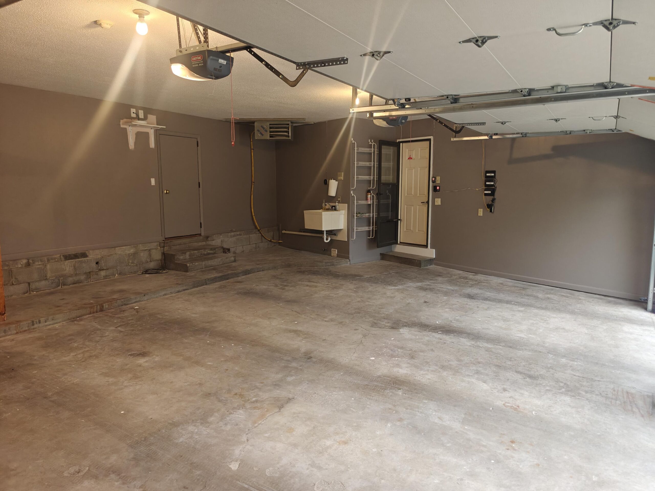 Uncoated concrete garage floor