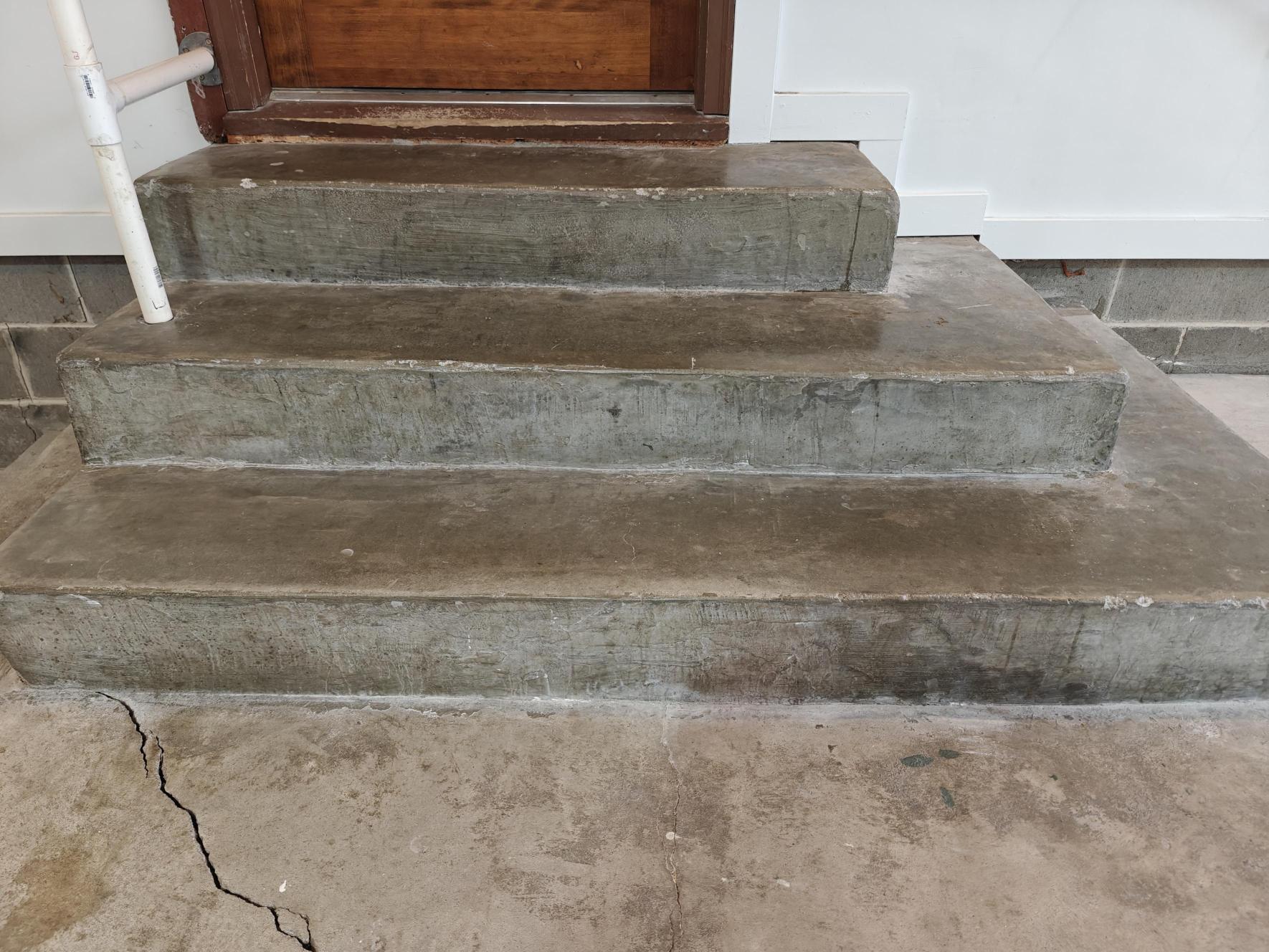 Dingy bare concrete in garage