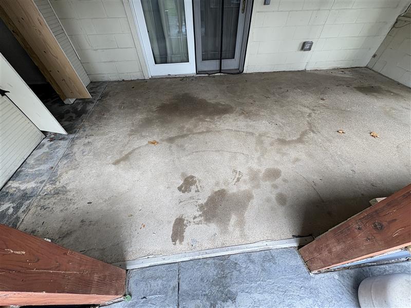 uncoated stained patio concrete