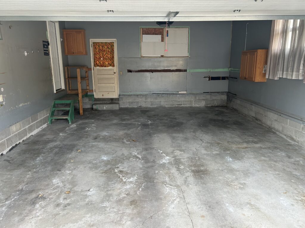 Garage Before Concrete Coating and Storage in Omaha Nebraska
