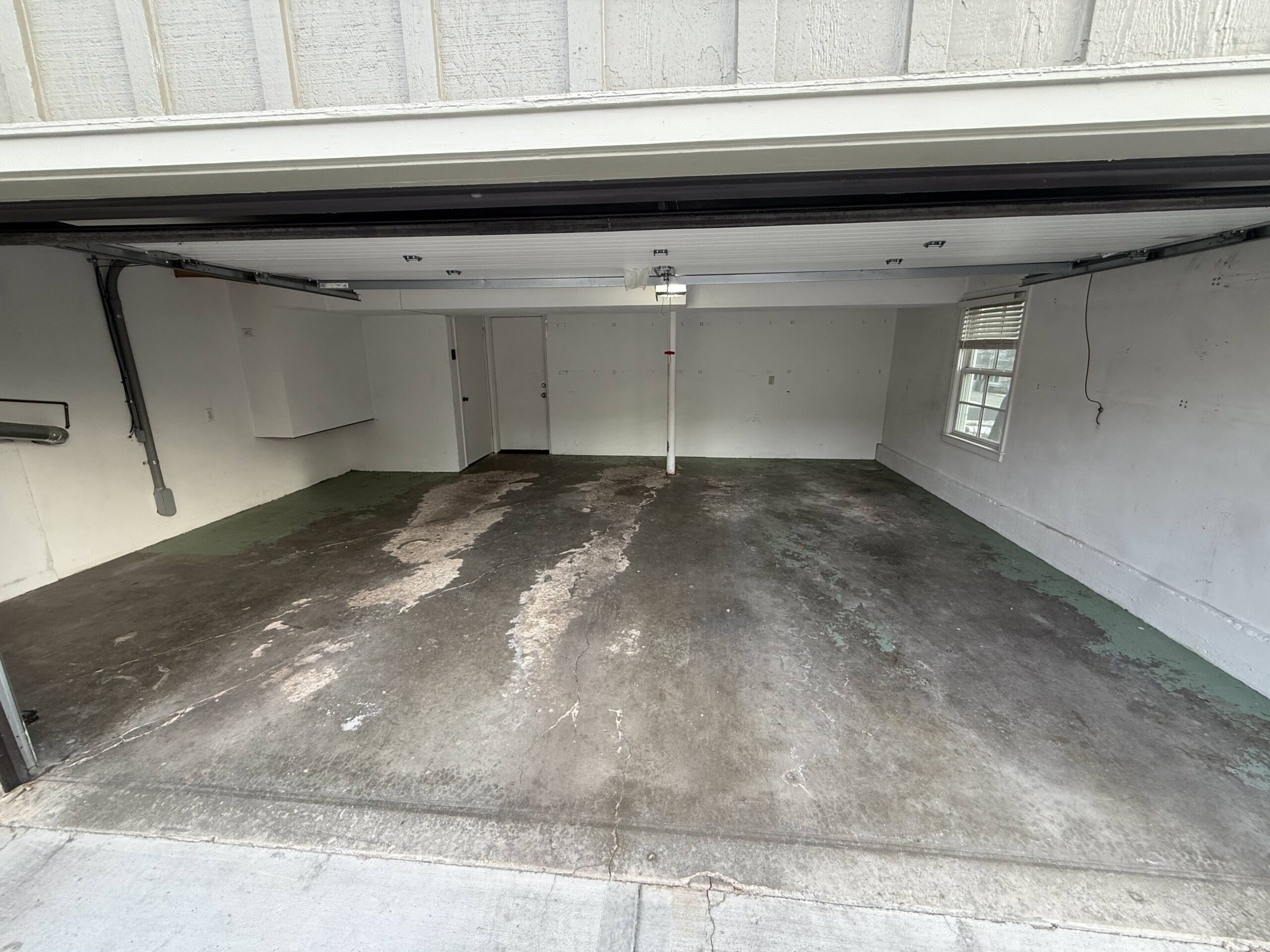 Garage before concrete coating and storage