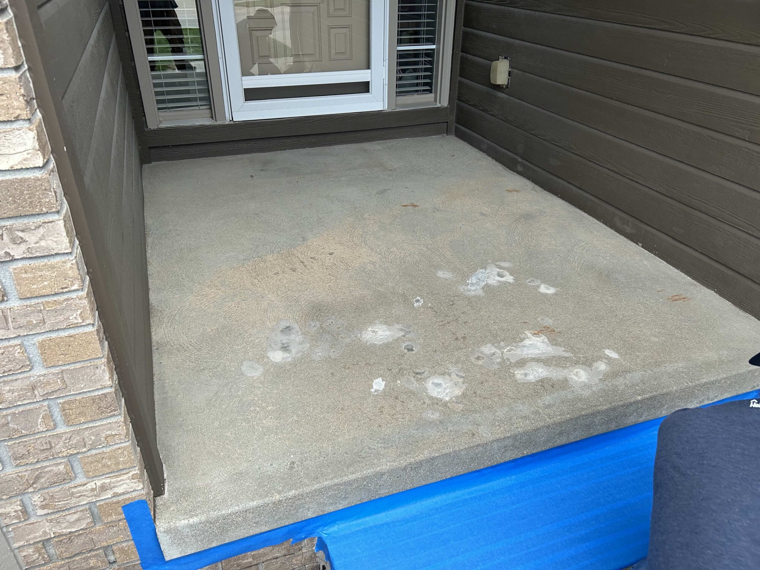 Worn Front Porch before coating installation in Omaha Nebraska