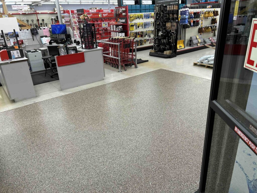 Commercial Concrete Coating in a store entryway in the color taupe