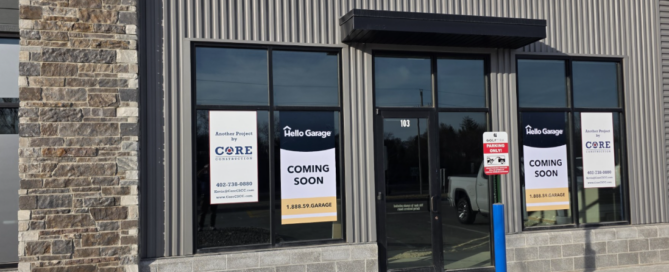 New Showroom for Hello Garage in Elkhorn with signs on the door that say coming soon