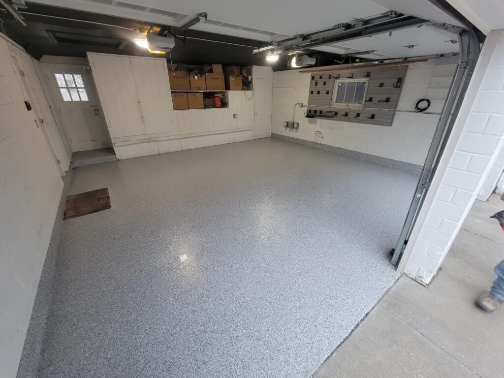 Papillion Garage Floor Coating and slatwall Installation