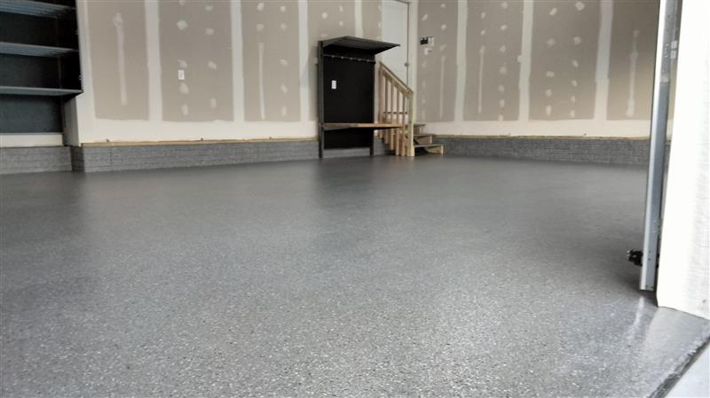Garage floor coating and storage near the garage door to house