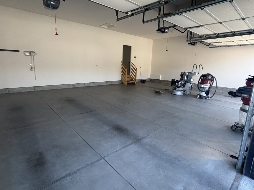 garage peeling floor before garage floor coating in papllion