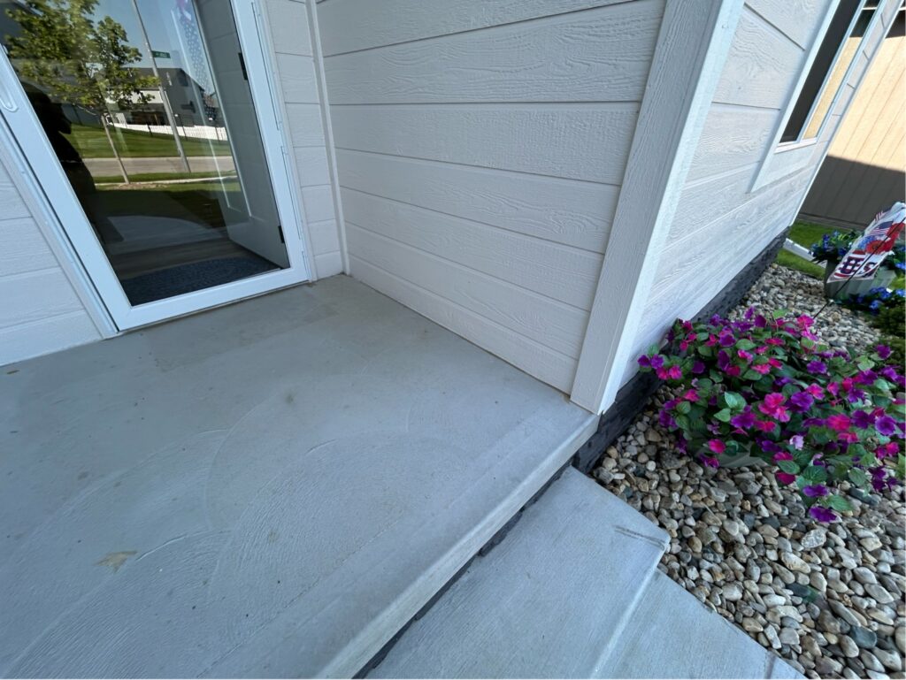 Before porch concrete coating in Bellevue