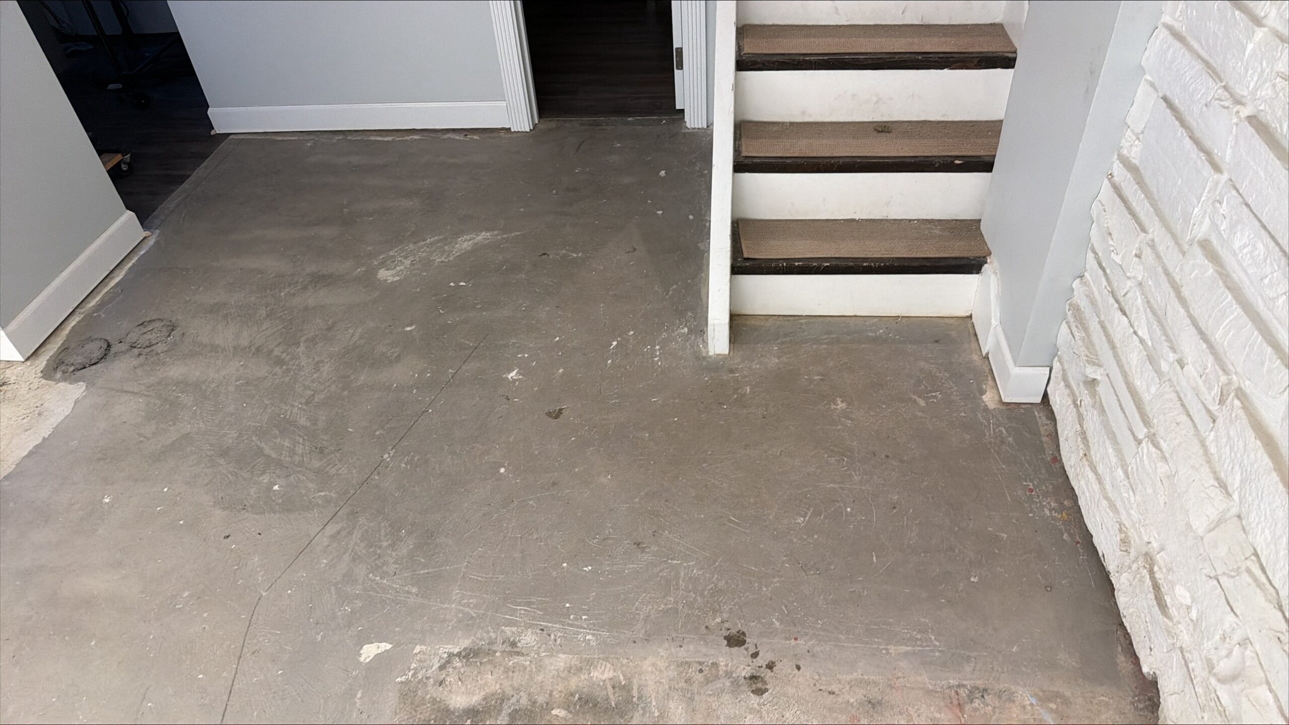 Basement floor with bare concrete