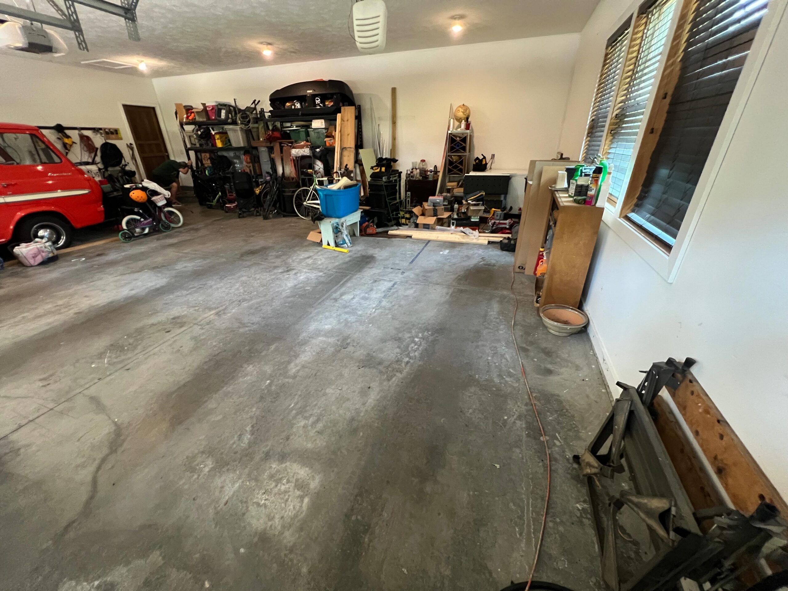 Garage flooring and storage in Lincoln NE Before photo
