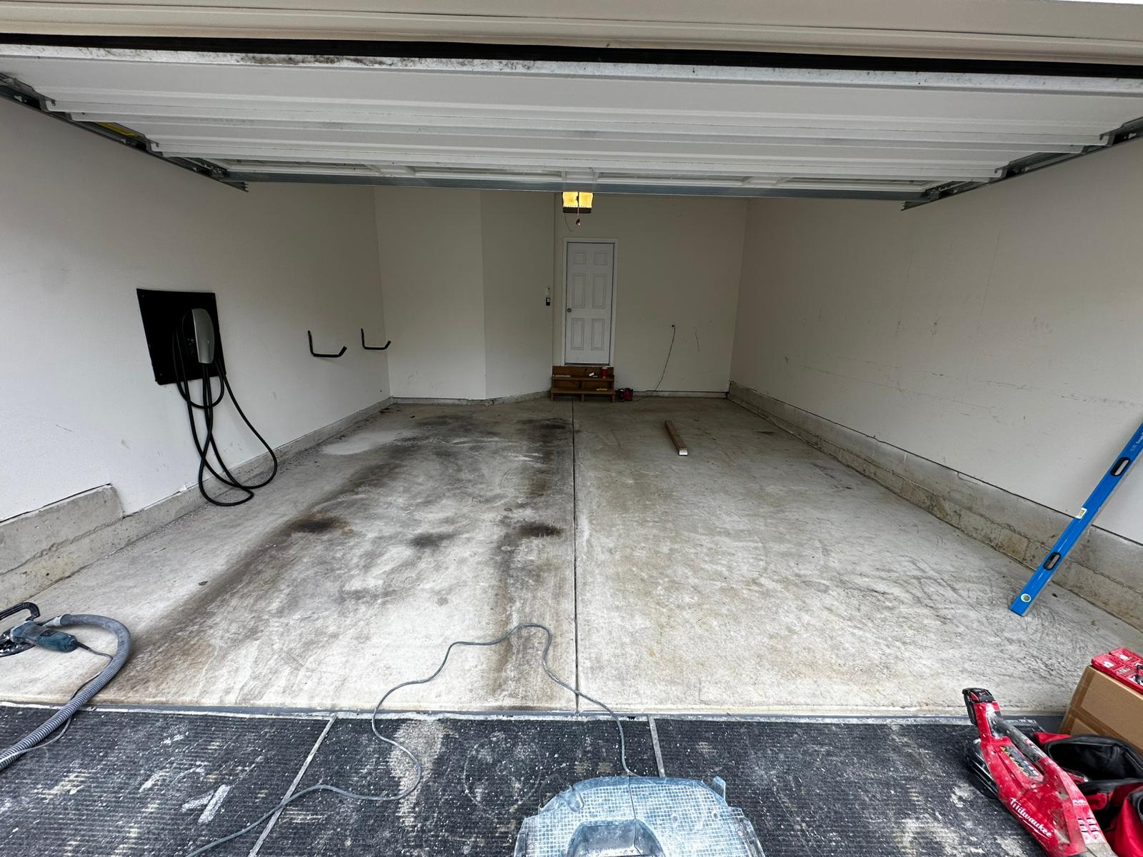 dingy, stained garage concrete floor