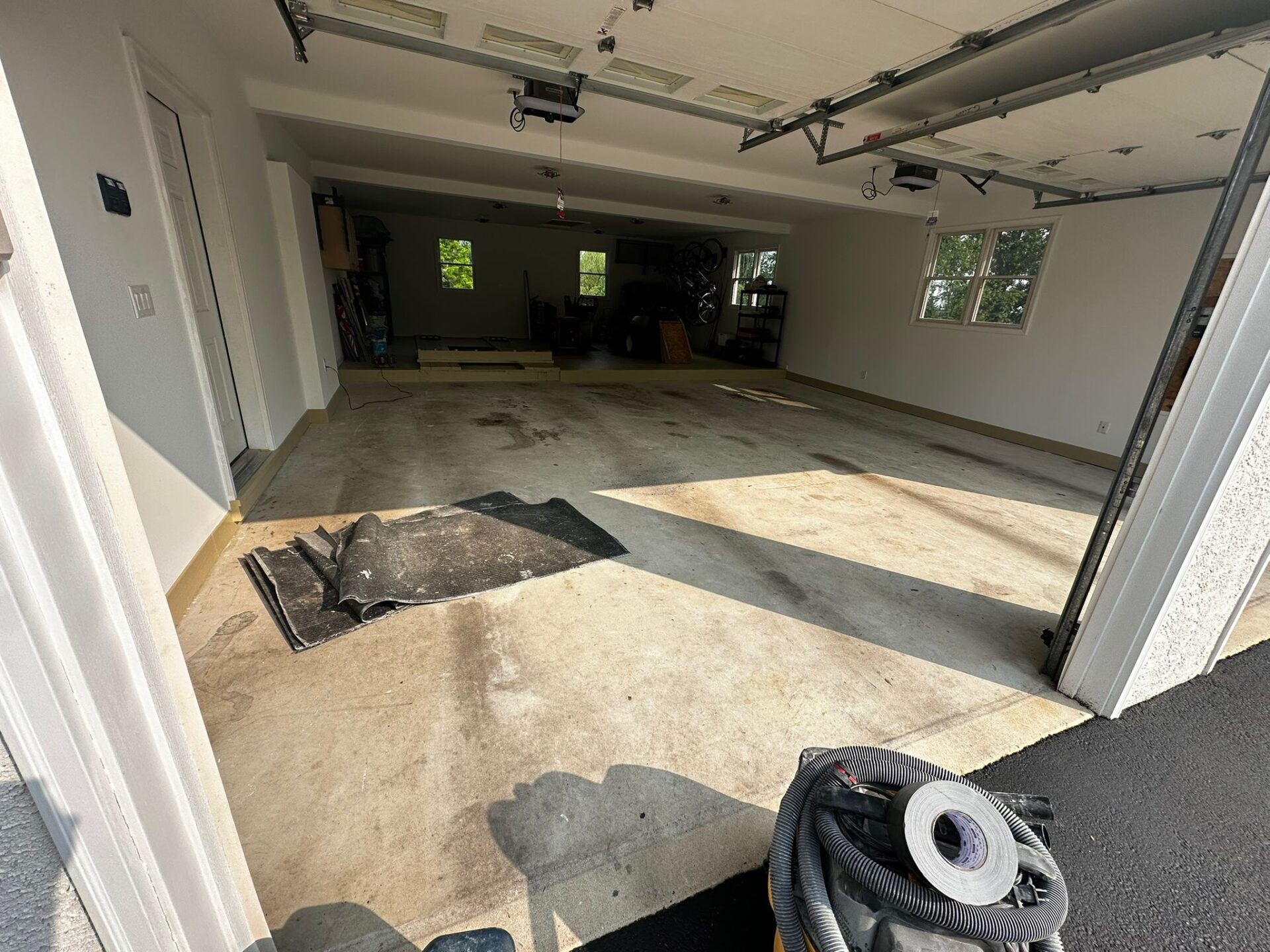 stained, dingy garage concrete