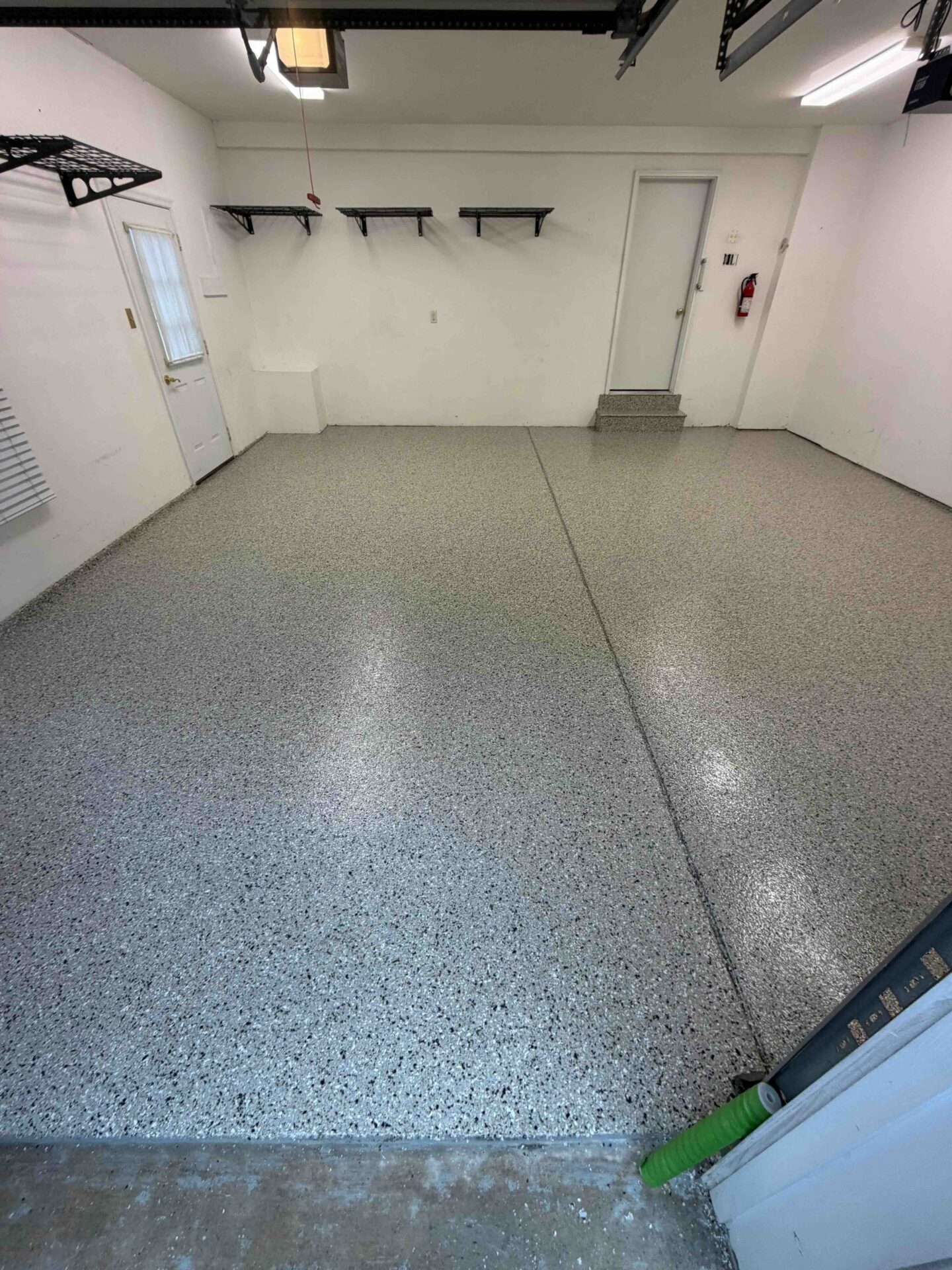 Garage Floor Coating completed in Downington in the color Black Taupe by Hello Garage