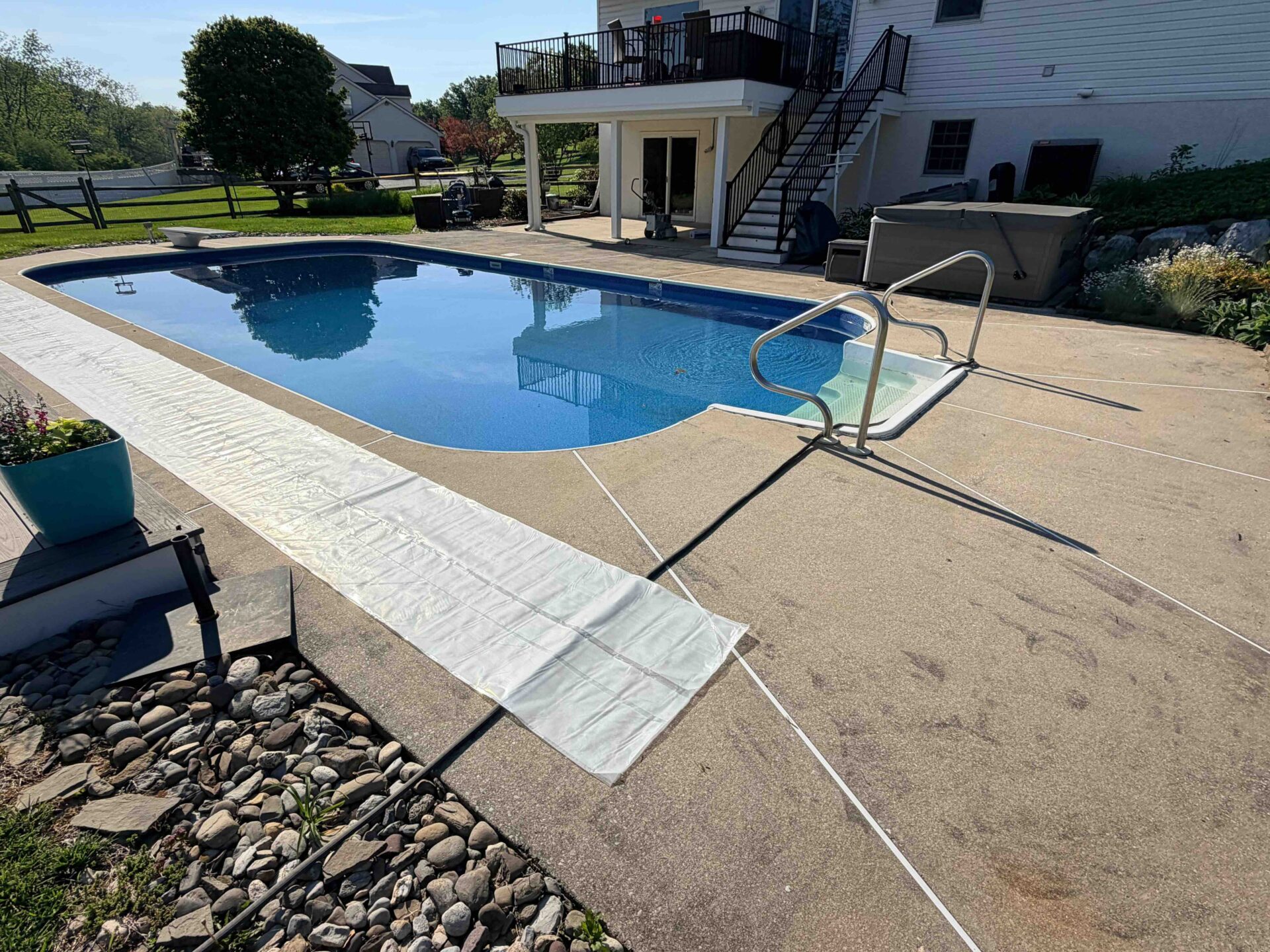 Uncoated concrete pool deck