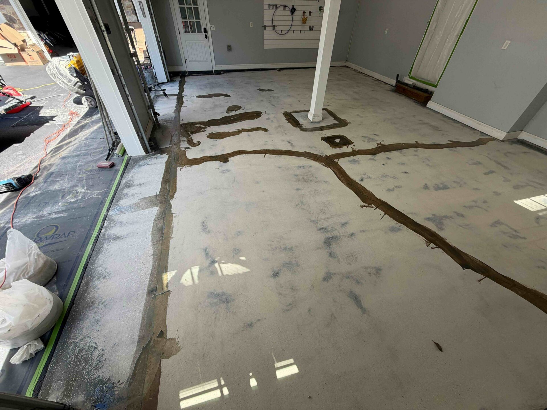 garage floor coating before in Malvern