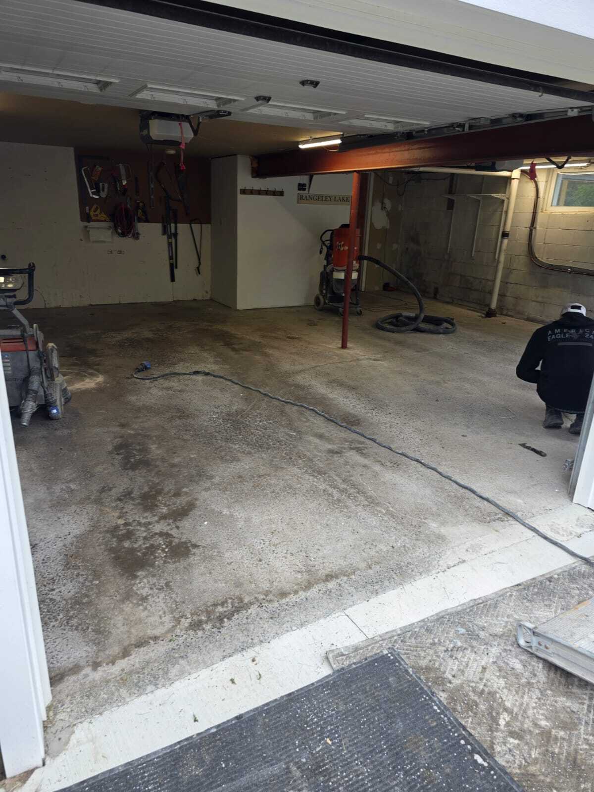 Stained and dingy garage floor concrete