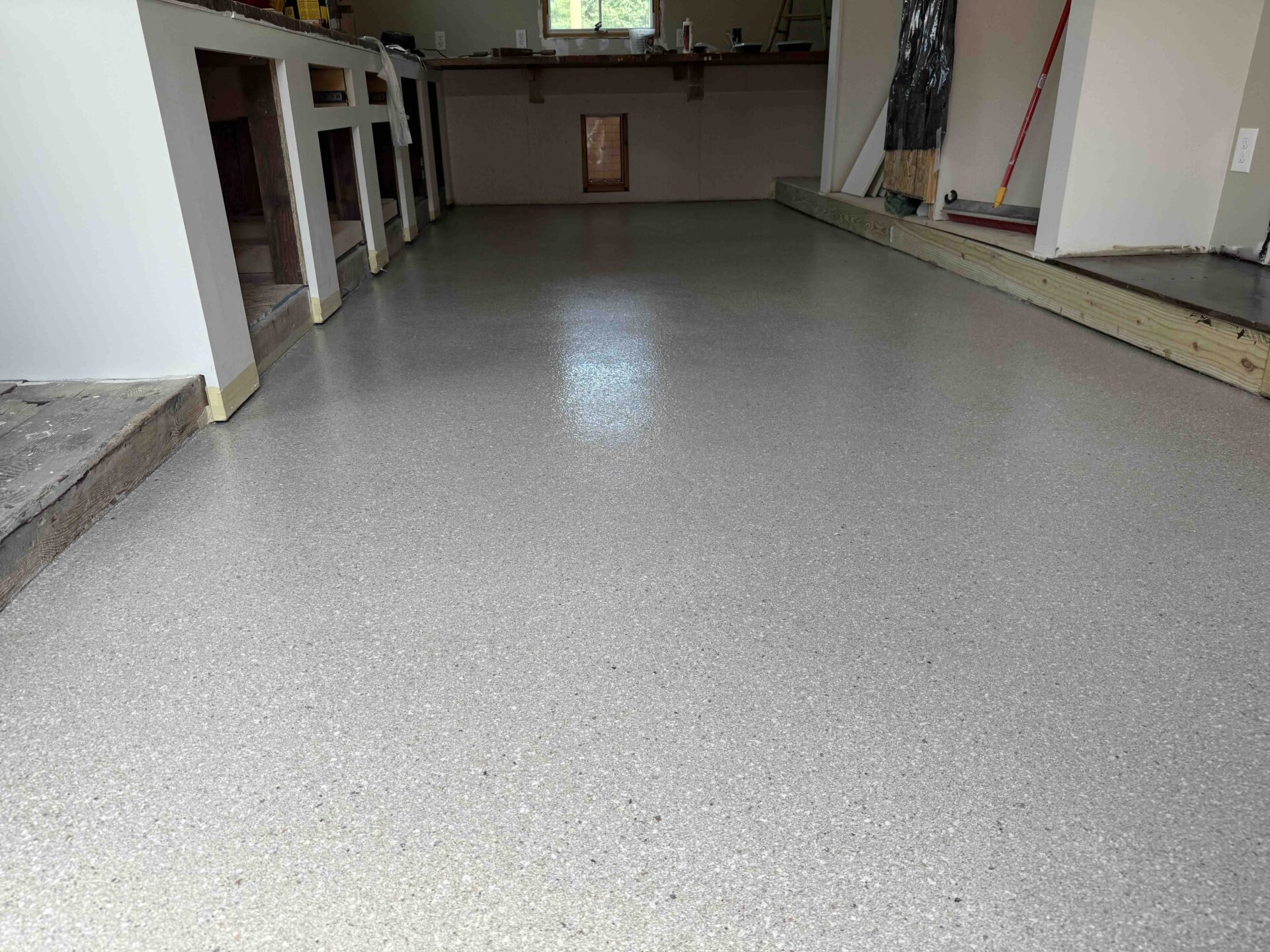 Concrete Coating in a commercial space in the color Bronze