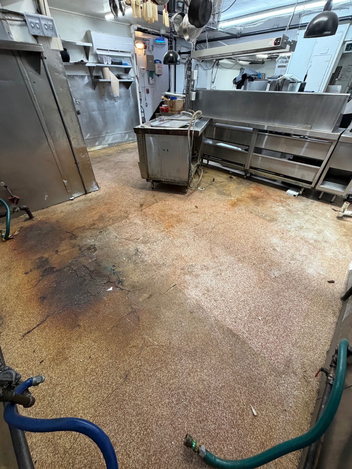 Commercial Kitchen before a concrete coating in Newport