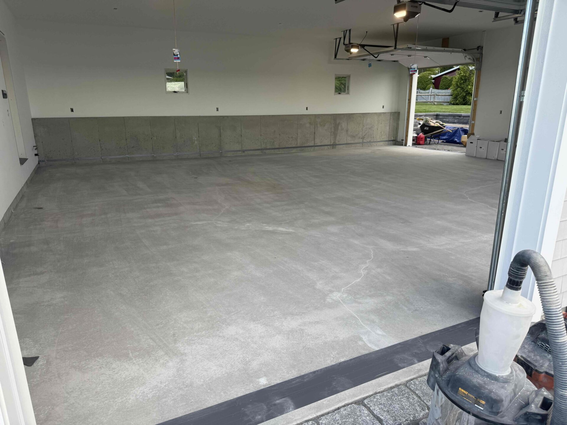Bare Concrete Garage Floor in Warwick, Rhode Island Before a Garage Floor Coating
