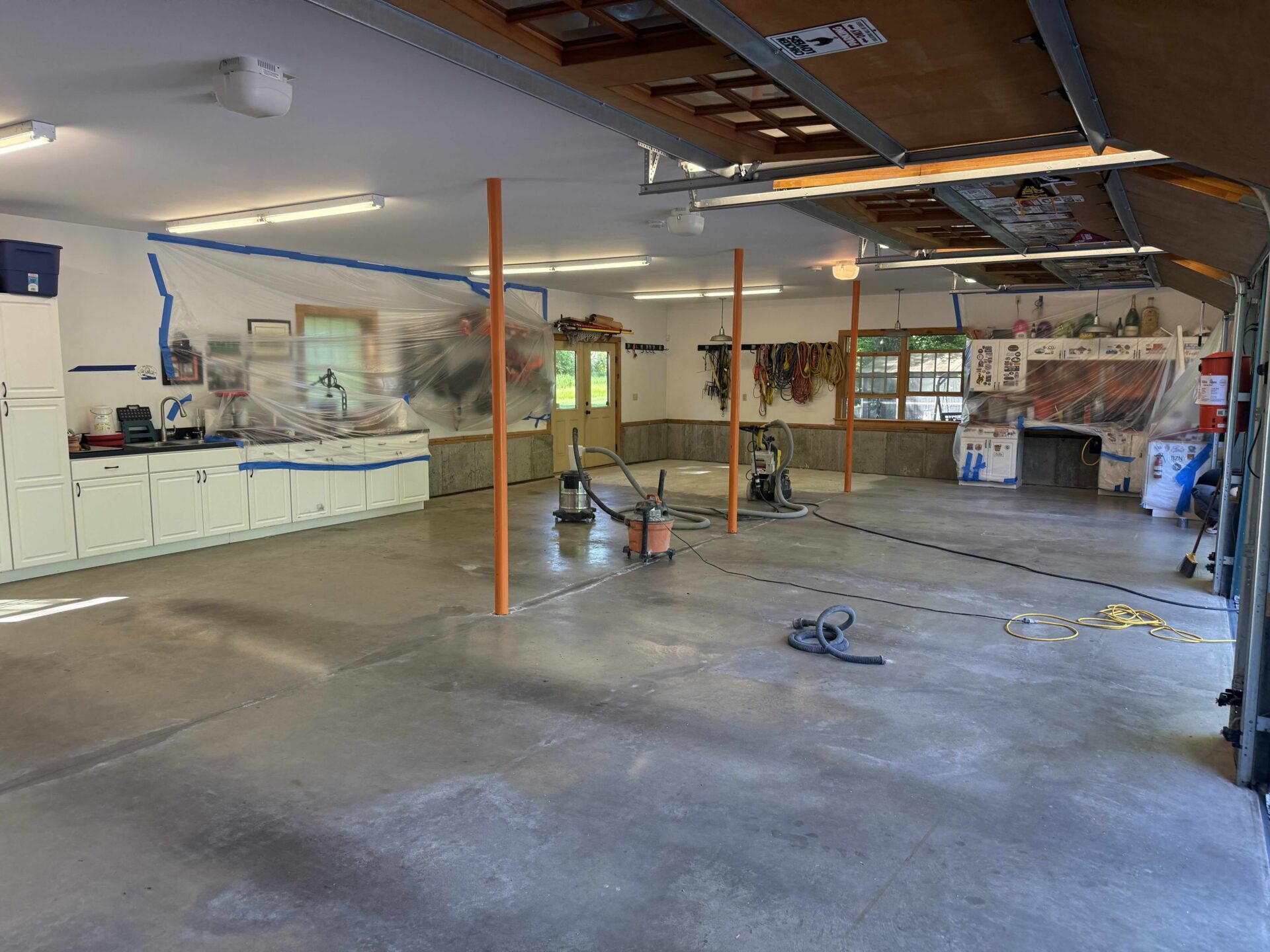 stained, uncoated garage floor
