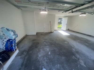 garage floor coating before in East Greenwich