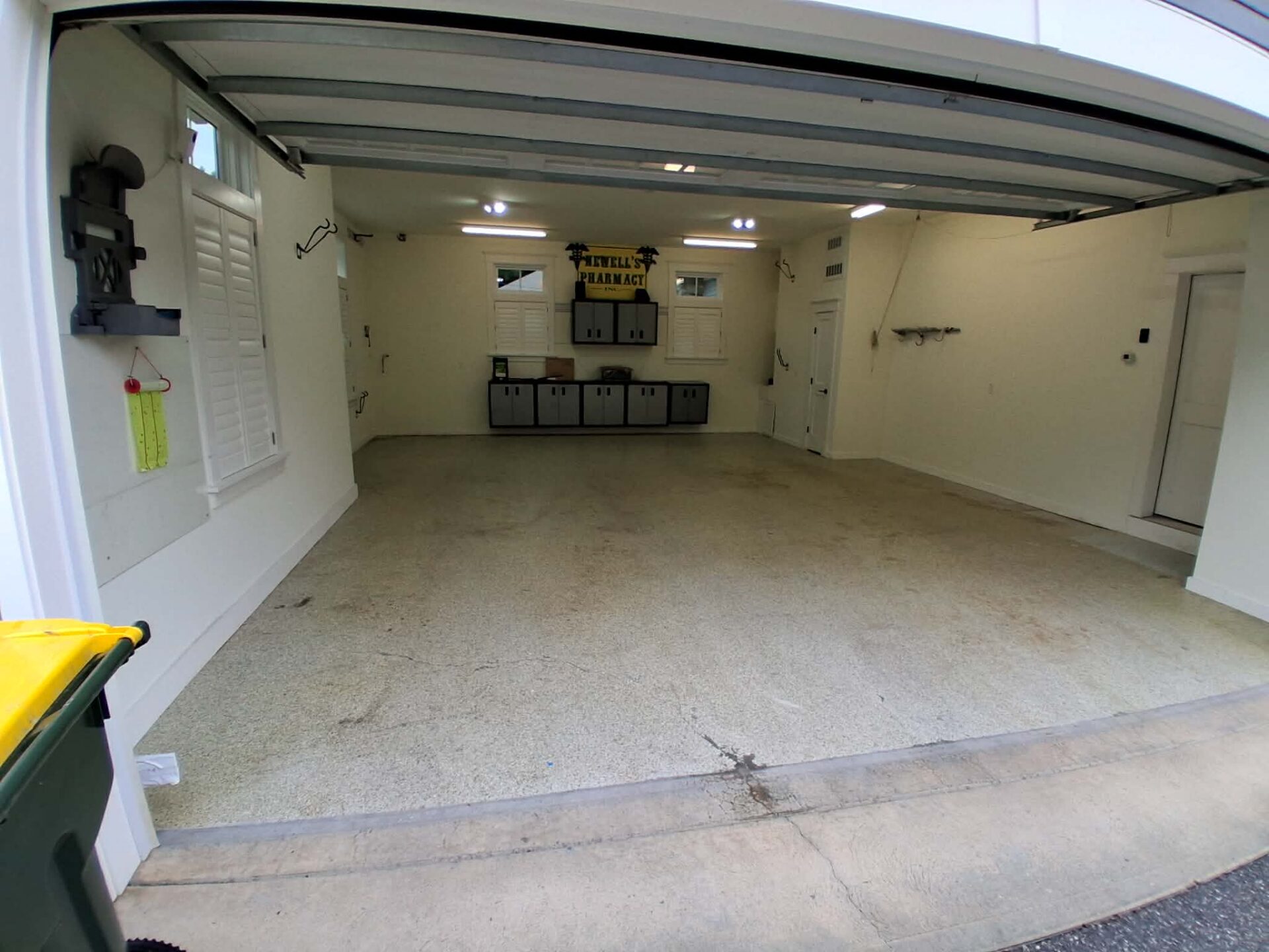 garage with chipped epoxy floor