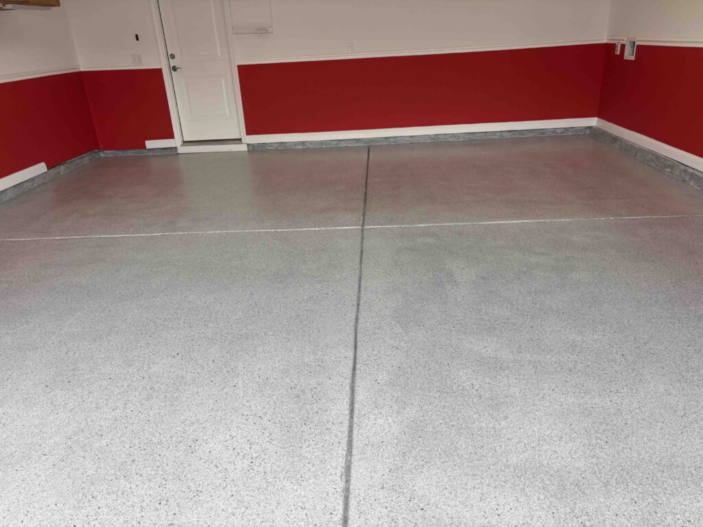 Garage Floor Coating in Calabash after a new polyaspartic coating in the color onyx by Hello Garage